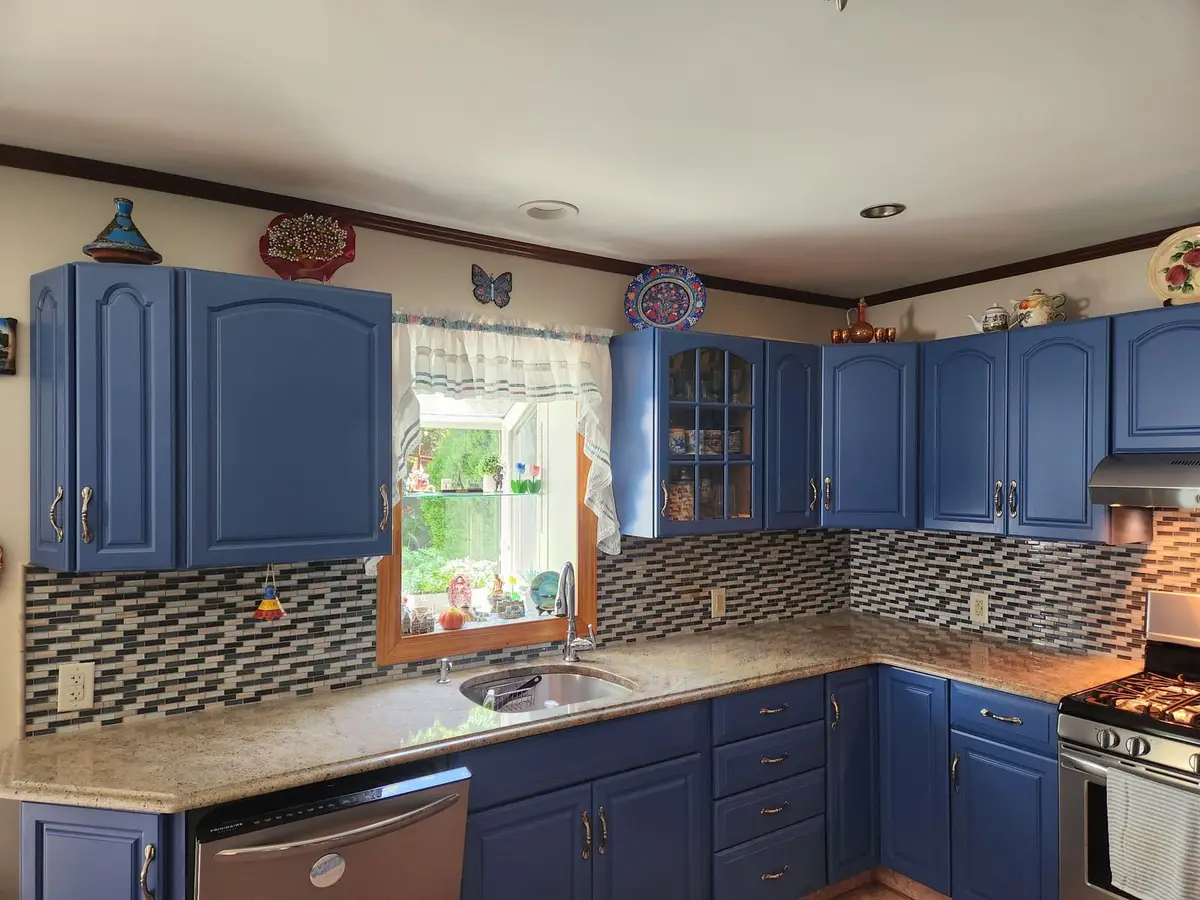 Glass Mosaic Backsplash — Beautiful glass mosaic tile in horizontal brick pattern with blue, brown, and cream tones