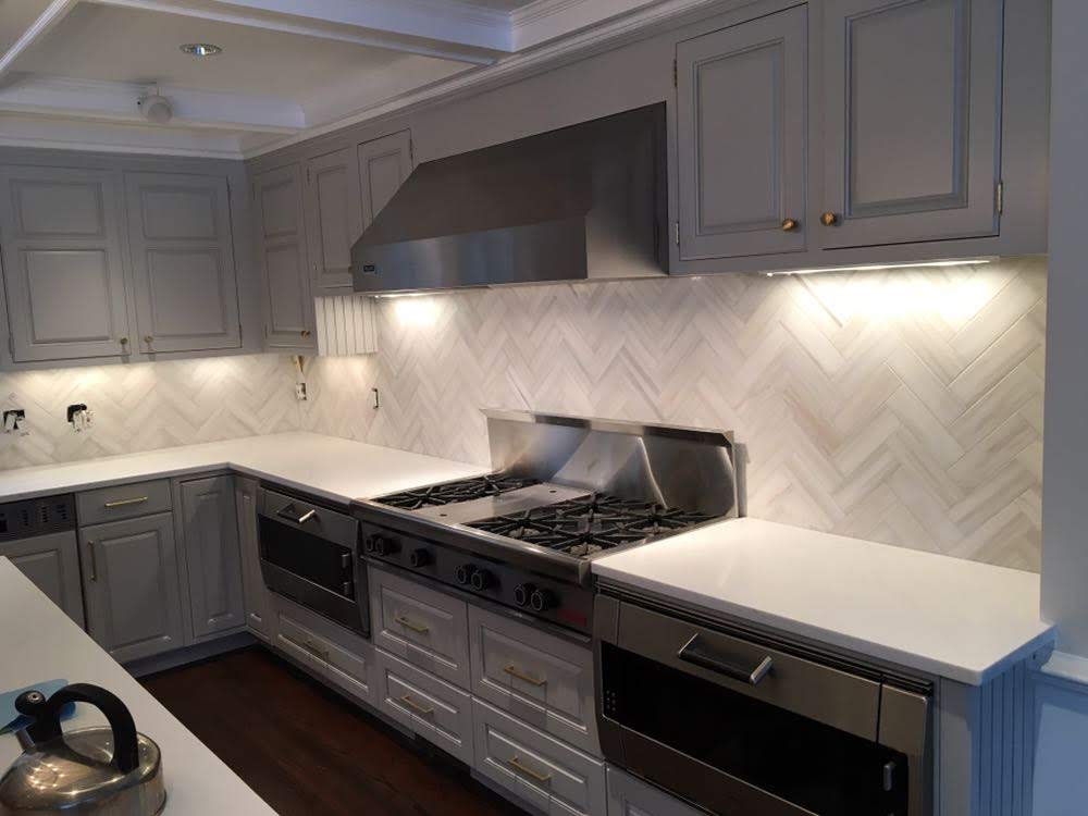 Herringbone marble backsplash Harrison