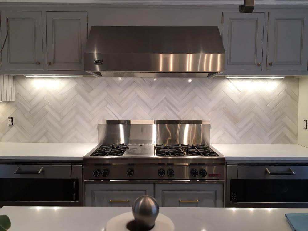 Herringbone marble backsplash Riverside