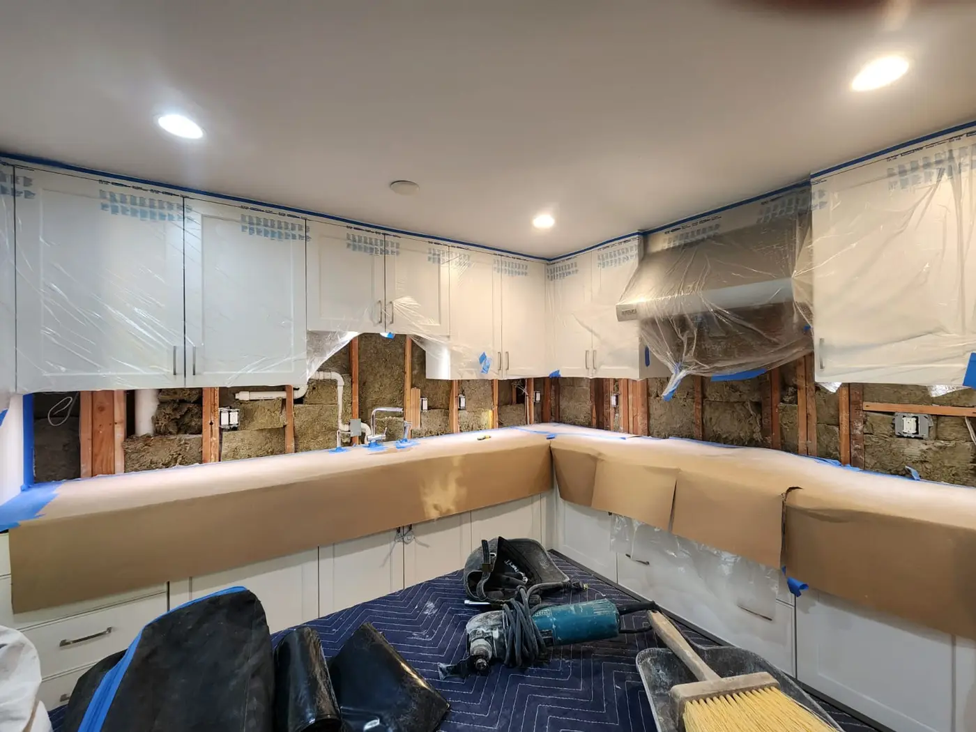 Greenwich CT kitchen stripped back to drywall before the porcelain backsplash